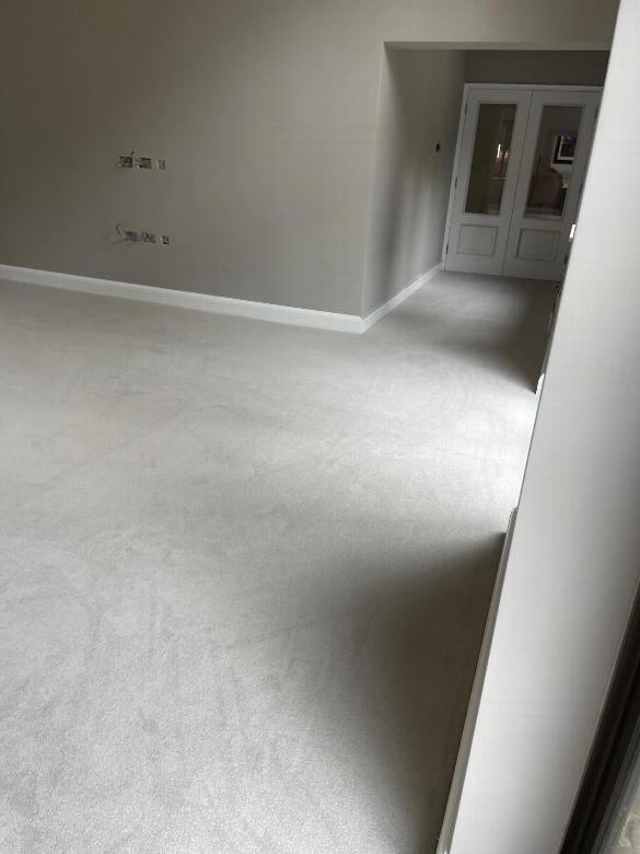 Newly laid carpet in home extension